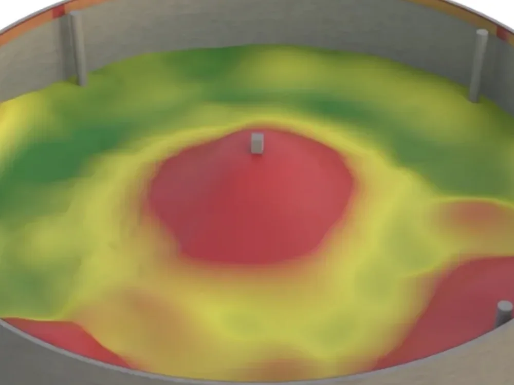 Colour-mapped survey of a tank floor, showing variation across the plate rendered from green through yellow to red.